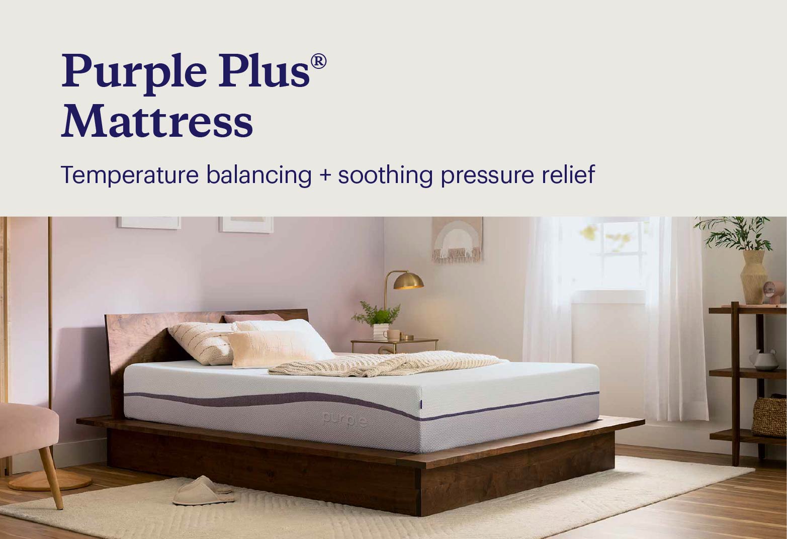 Key features of the Purple plus® mattress shown with the unmade mattress on a modern wood bed frame in a boho bedroom.