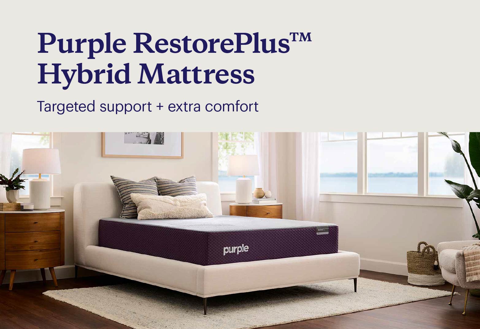 Key features of the Purple RestorePlus™ shown with the mattress on low upholstered bedframe in a beachy bedroom.