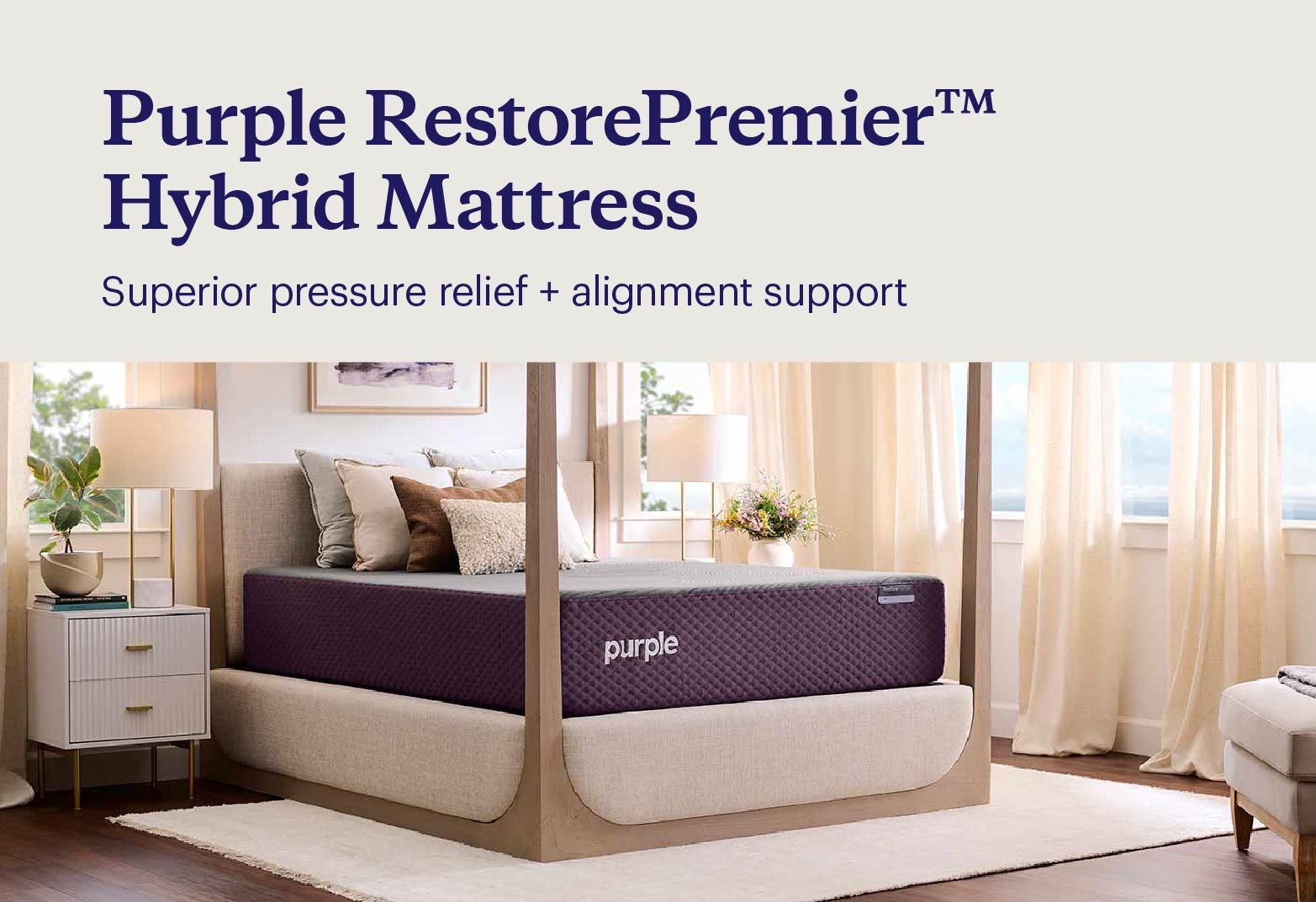 Key features of the RestorePremier™ Hybrid shown with the mattress on a poster-style bedframe in a luxurious bedroom.