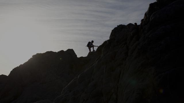 Person hiking mountain