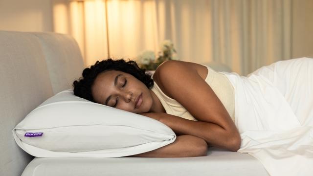 woman sleeping with harmony pillow