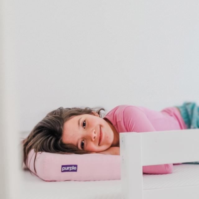 girl with purple pillow