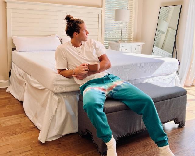 Man sitting on NewDay Mattress