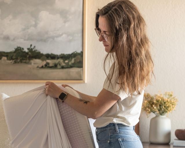 Woman with DreamLayer pillow