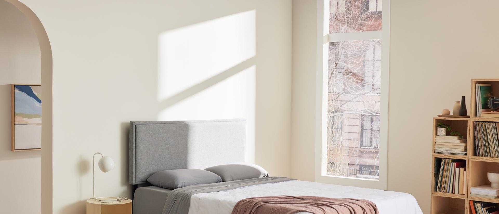 Bedroom scene with Purple Mattress, Bed Frame & Bedding