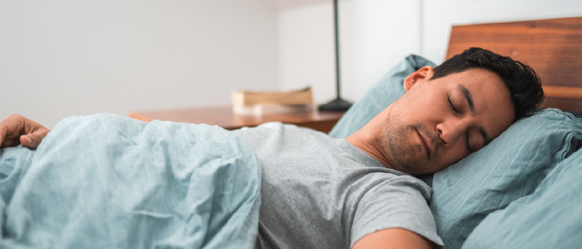 Man sleeping in bed